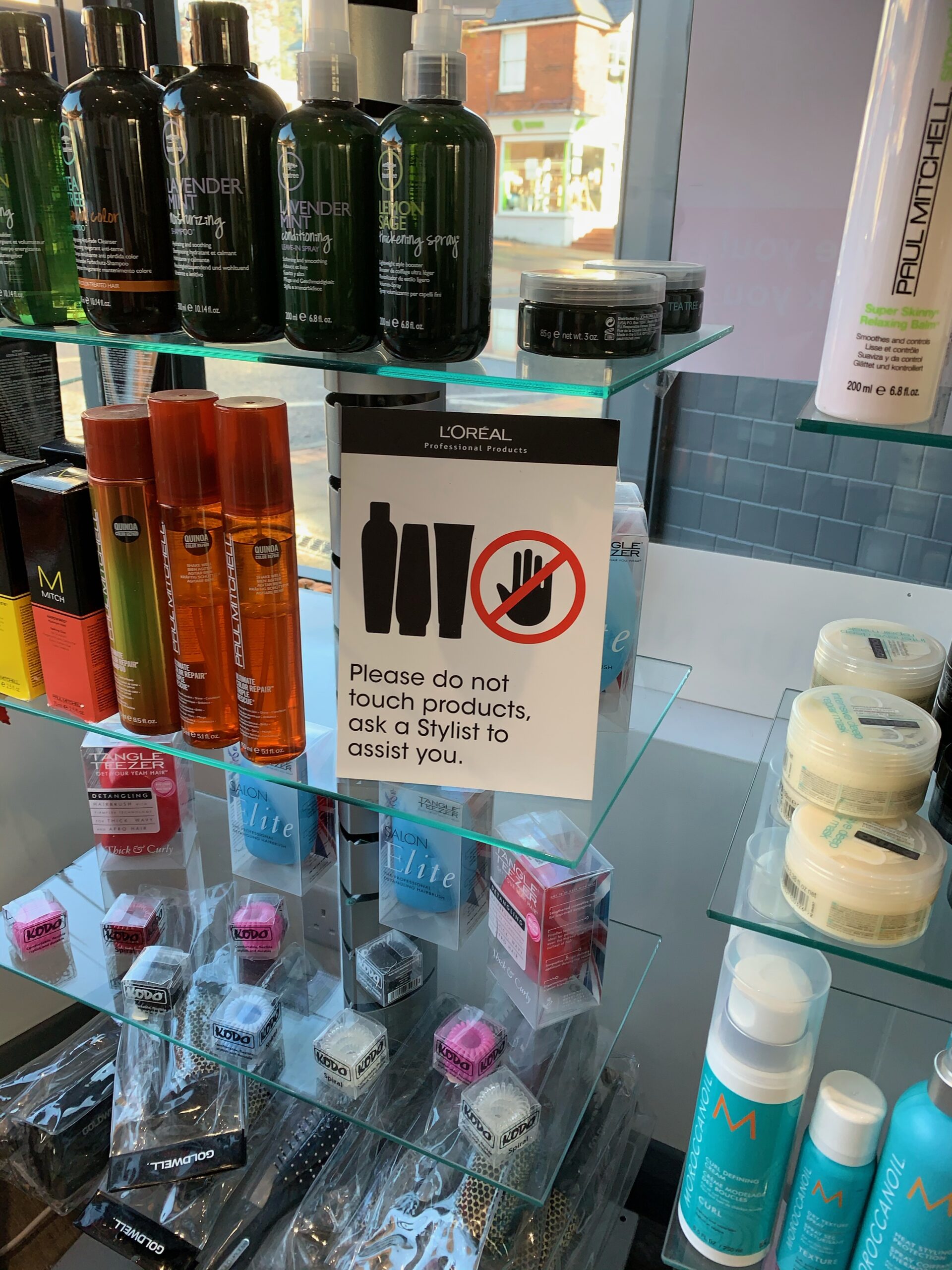 We ask clients not to touch products.